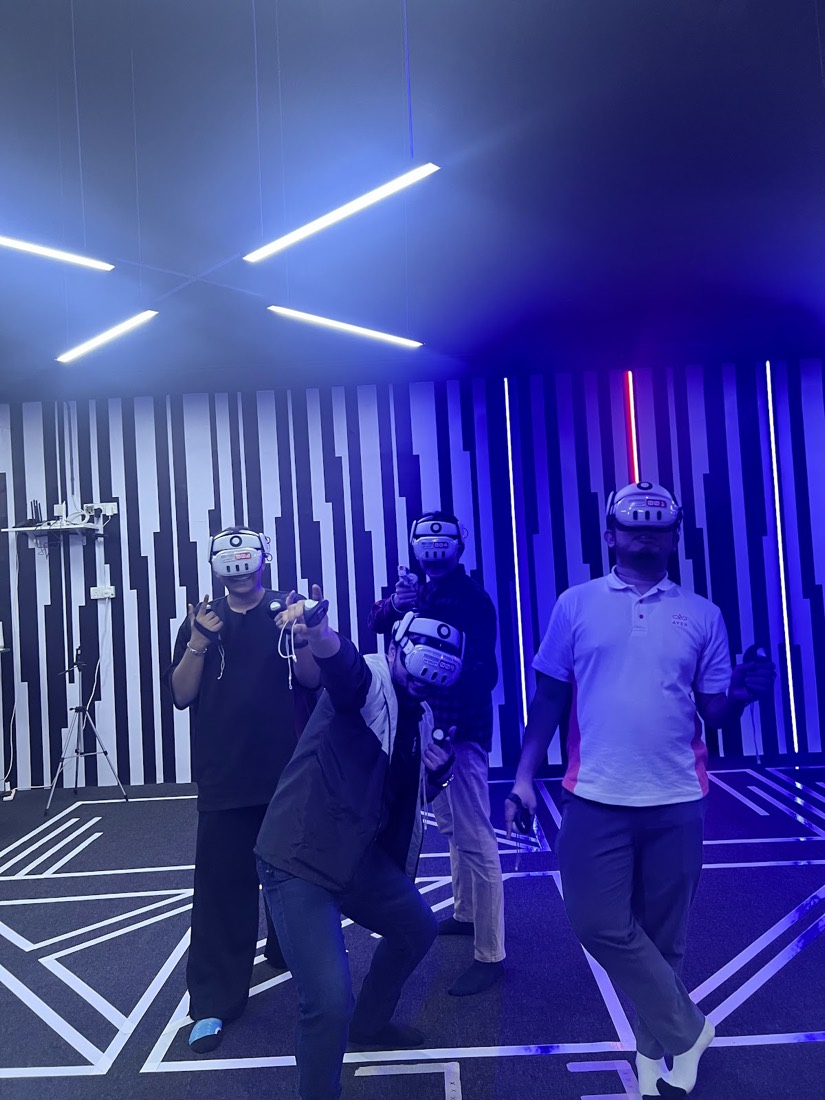 Friends mid-mission on the arena floor — guest photo, Cyberjaya arena